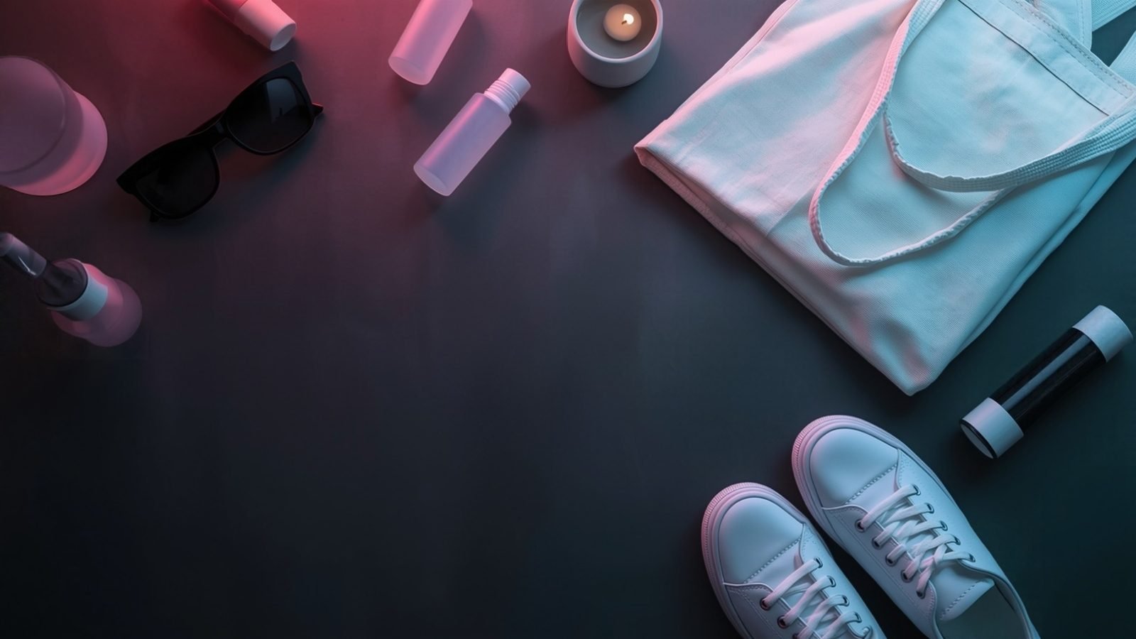 A flat-lay of consumer products arranged on a studio table